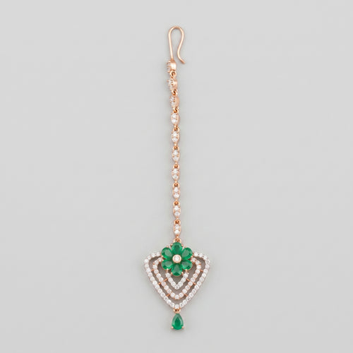 Pushpa Emerald Tikka rose gold-tone maang tikka with green floral heart pendant on gray background