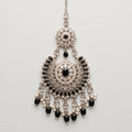 Onyx Pearl Tikka silver chaandbali maang tikka with black stones and pearl fringe on gray background