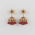 Amrita Ruby Earrings gold kundan jhumkas with ruby and clear stones on gray background