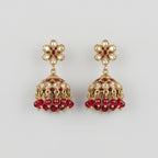 Amrita Ruby Earrings gold kundan jhumkas with ruby and clear stones on gray background