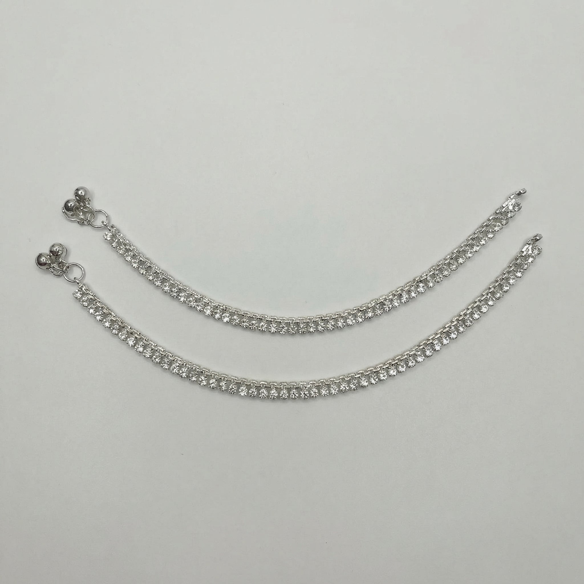 Starlight Anklet detail showing linked square stones and polished silver finish