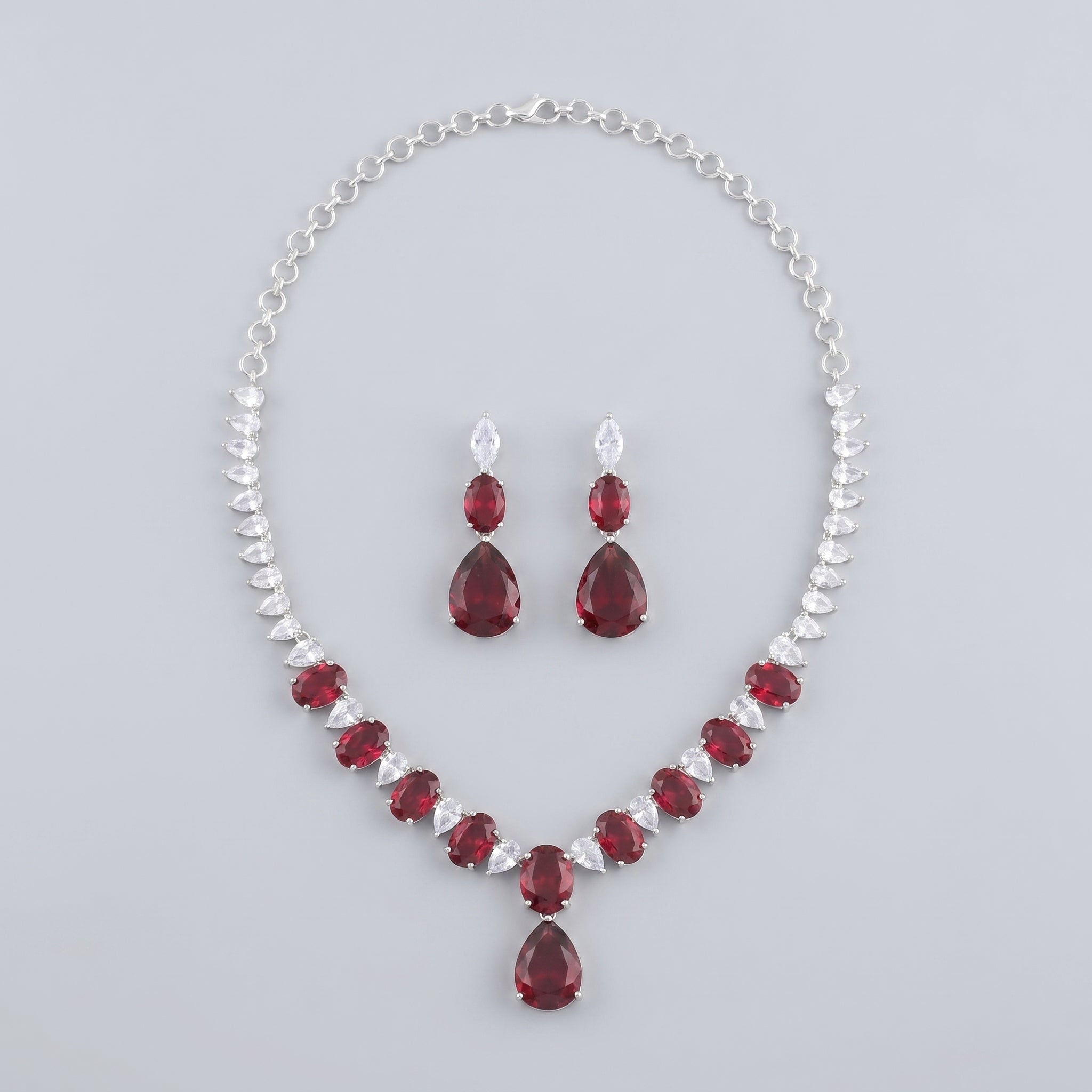 Rani Ruby Necklace Set silver collar with ruby-red oval and pear stones and matching earrings