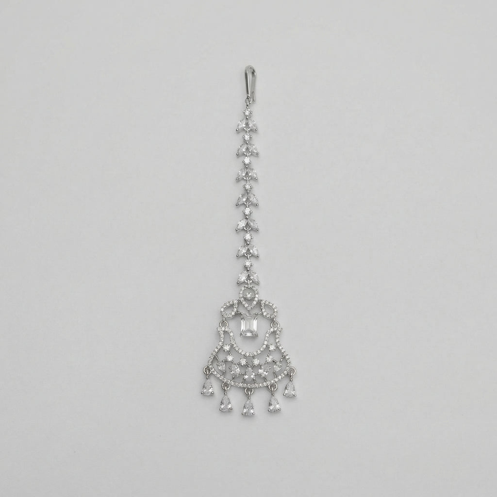 Crystal Drop Tikka silver maang tikka with marquise chain and emerald-cut center on gray background