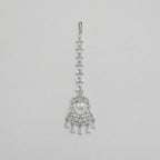Crystal Drop Tikka silver maang tikka with marquise chain and emerald-cut center on gray background
