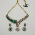 Jadau Emerald Necklace Set asymmetric silver collar with emerald stones and matching earrings