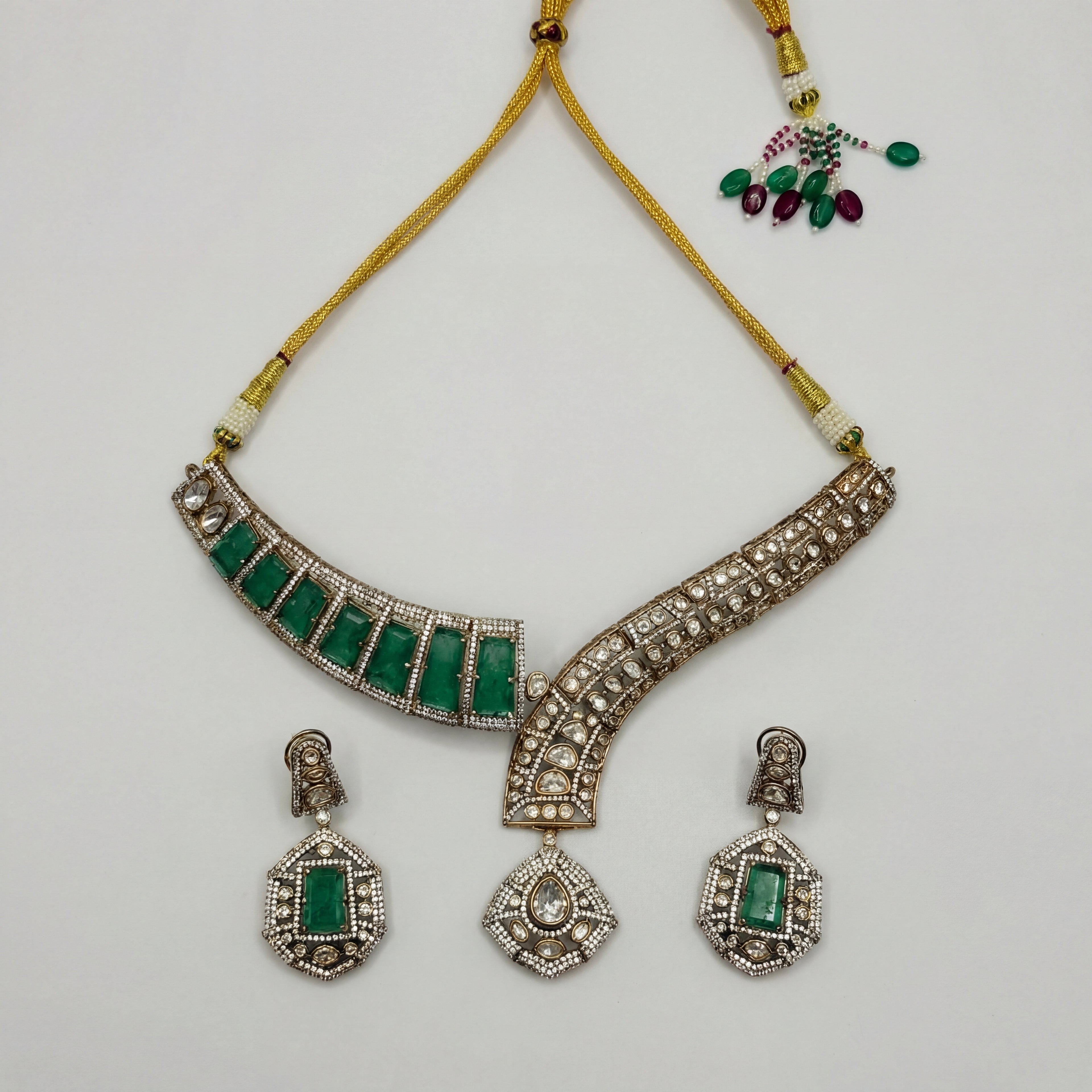 Jadau Emerald Necklace Set asymmetric silver collar with emerald stones and matching earrings