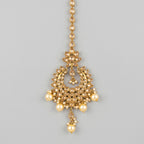 Jadau Pearl Tikka gold chandbali maang tikka with champagne stones and cream pearl drops on gray background