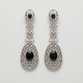 Zara Onyx Earrings silver-tone black onyx three-tier drop earrings with crystal filigree on gray background