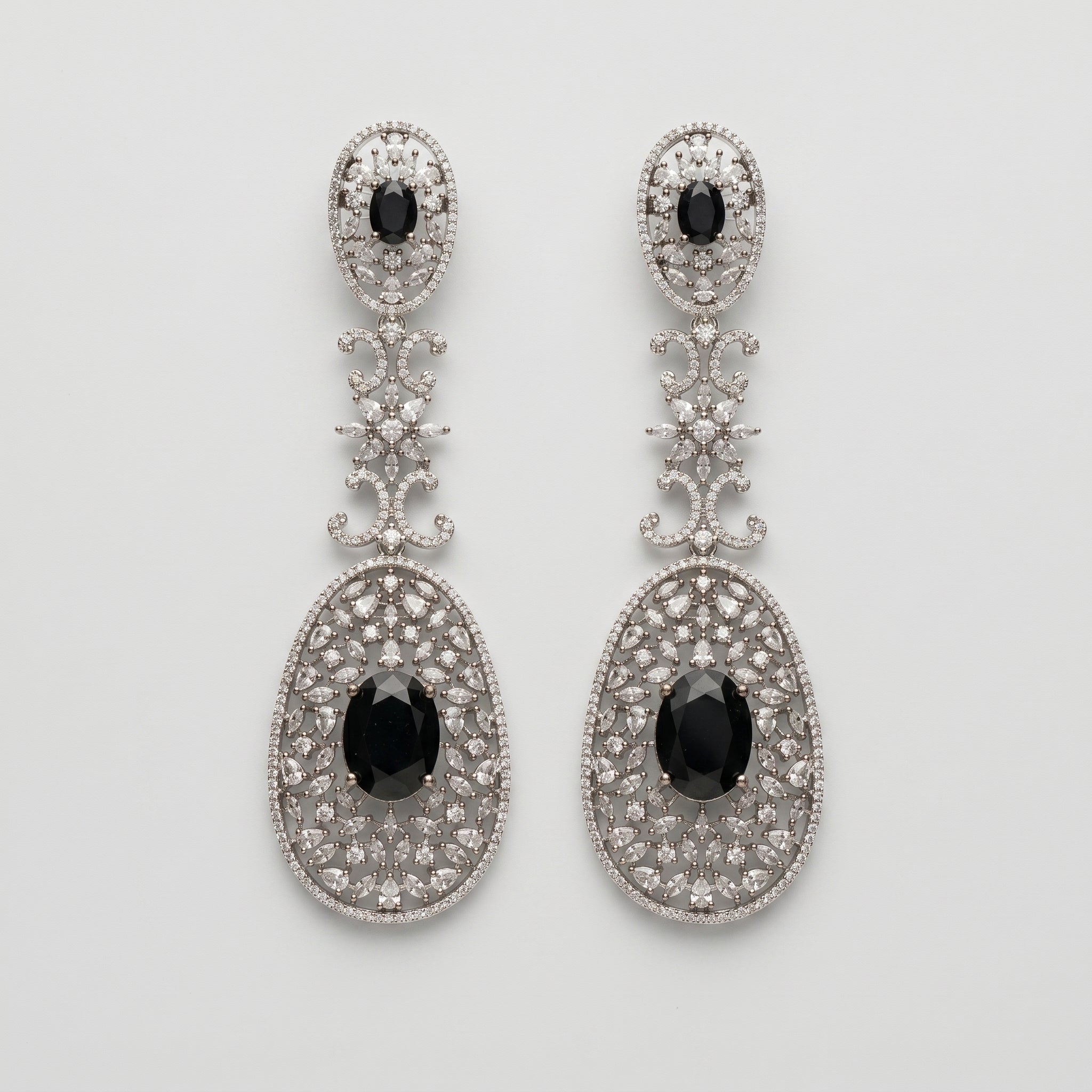 Zara Onyx Earrings silver-tone black onyx three-tier drop earrings with crystal filigree on gray background