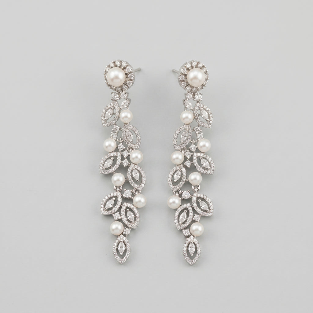 Bela Pearl Earrings silver-tone pearl vine drop earrings with marquise crystal leaves on gray background