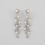 Bela Pearl Earrings silver-tone pearl vine drop earrings with marquise crystal leaves on gray background