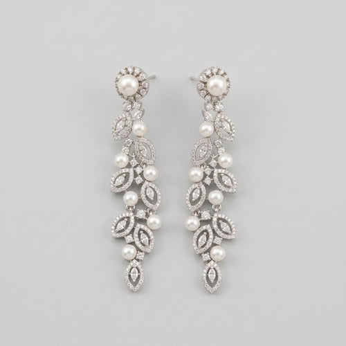 Bela Pearl Earrings silver-tone pearl vine drop earrings with marquise crystal leaves on gray background