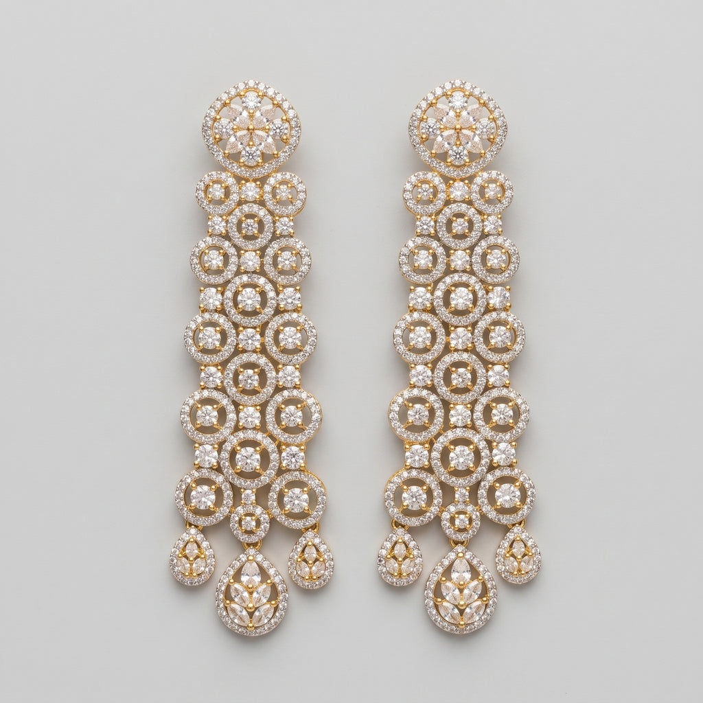 Rani Cascade Earrings long gold-tone crystal circle chandelier drops on gray background