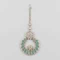 Aqua Star Tikka silver maang tikka with mint green wreath pendant on gray background