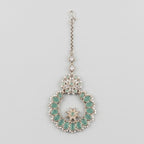 Aqua Star Tikka silver maang tikka with mint green wreath pendant on gray background