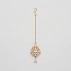 Riya Pear Tikka gold maang tikka with pear crystal halo pendant and teardrop drop on gray background