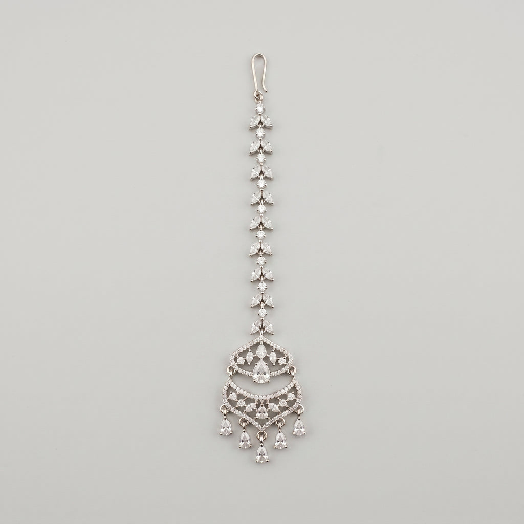 Rani Crystal Tikka silver-tone marquise chain maang tikka with crescent pendant on gray background