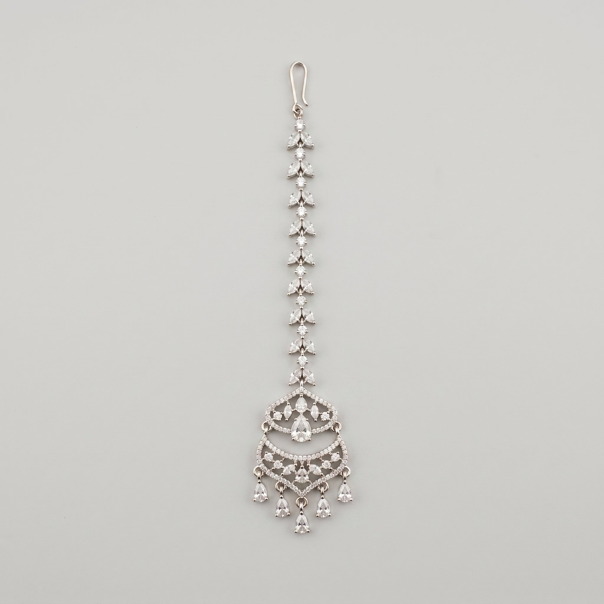 Rani Crystal Tikka silver-tone marquise chain maang tikka with crescent pendant on gray background