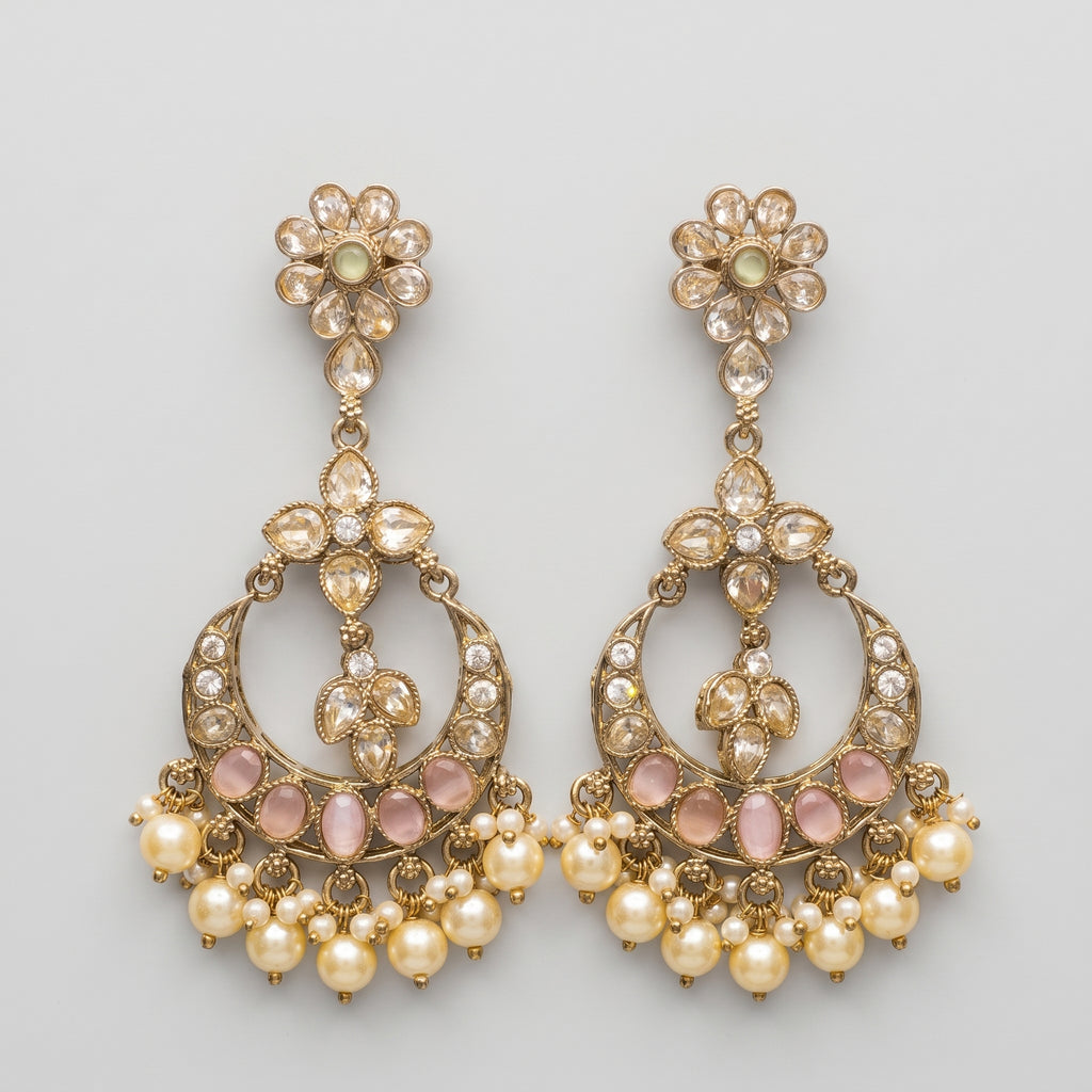 Chandni Pearl Earrings gold chandbali with pink cabochons and pearl fringe on gray background
