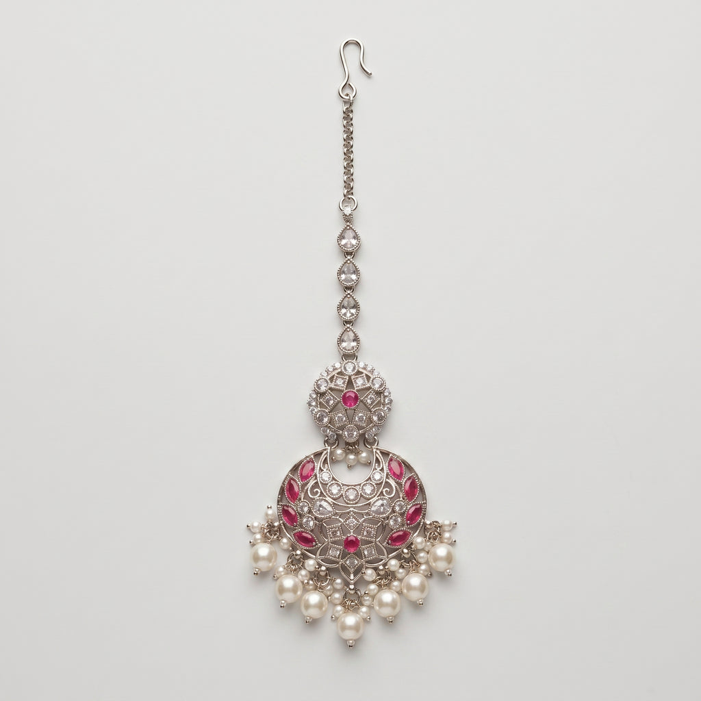 Gulabi Pearl Tikka silver chaandbali maang tikka with pink stones and pearl fringe on gray background