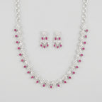 Gulab Droplet Necklace Set silver bib with pink teardrop stones and matching earrings