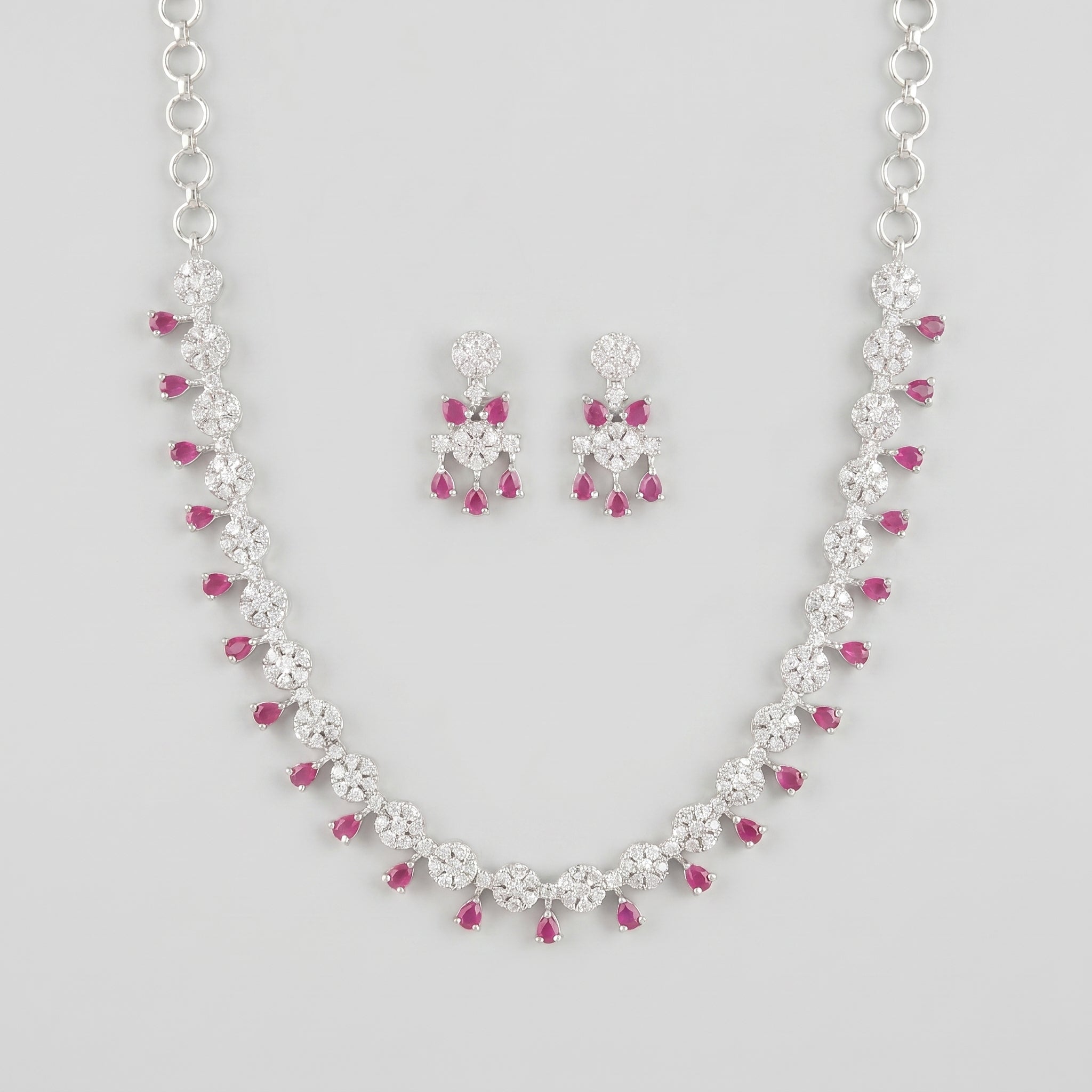 Gulab Droplet Necklace Set silver bib with pink teardrop stones and matching earrings