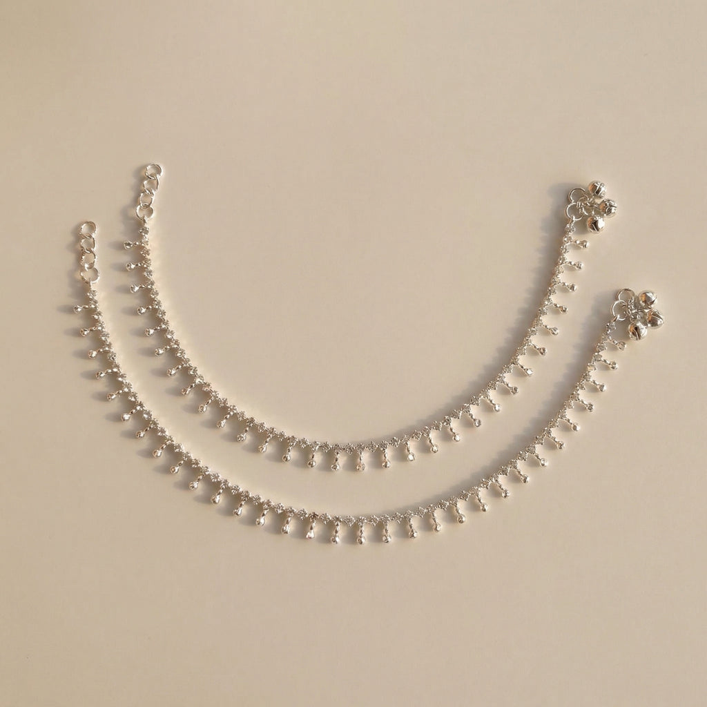 Sia Crystal Anklet pair of silver-tone payals with teardrop crystal dangles and bells