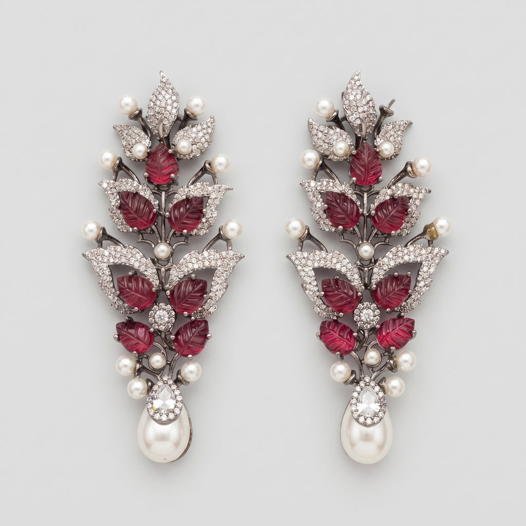Rani Ruby Earrings oxidized silver botanical drops with ruby leaves and pearl fringe on gray background