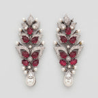 Rani Ruby Earrings oxidized silver botanical drops with ruby leaves and pearl fringe on gray background