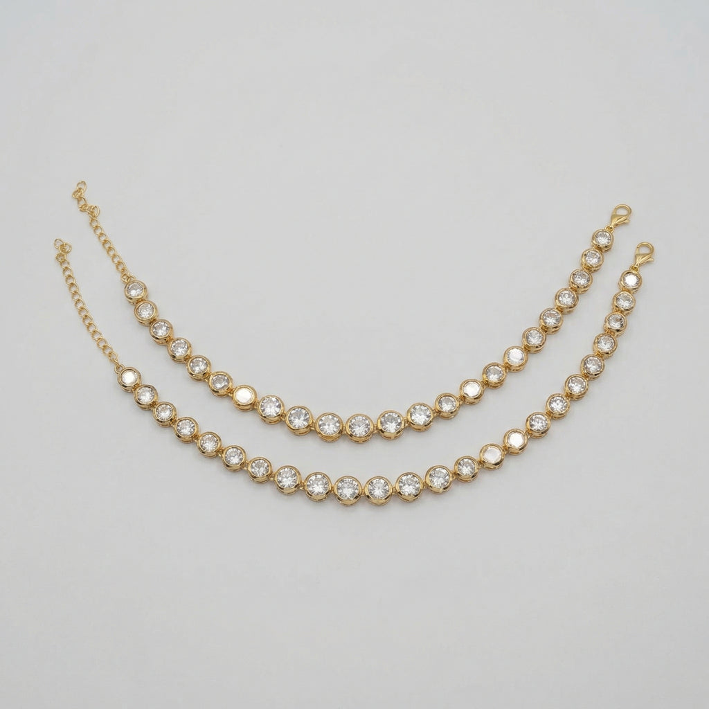 Jyoti Anklet pair of gold-tone round crystal tennis payals with extender chain