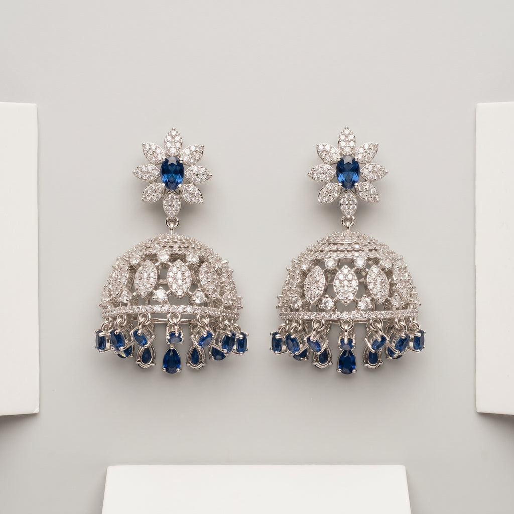 Neelam Jhumka Earrings rhodium jhumkas with blue pear fringe