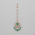 Panna Tikka rose-gold maang tikka with emerald green teardrop center