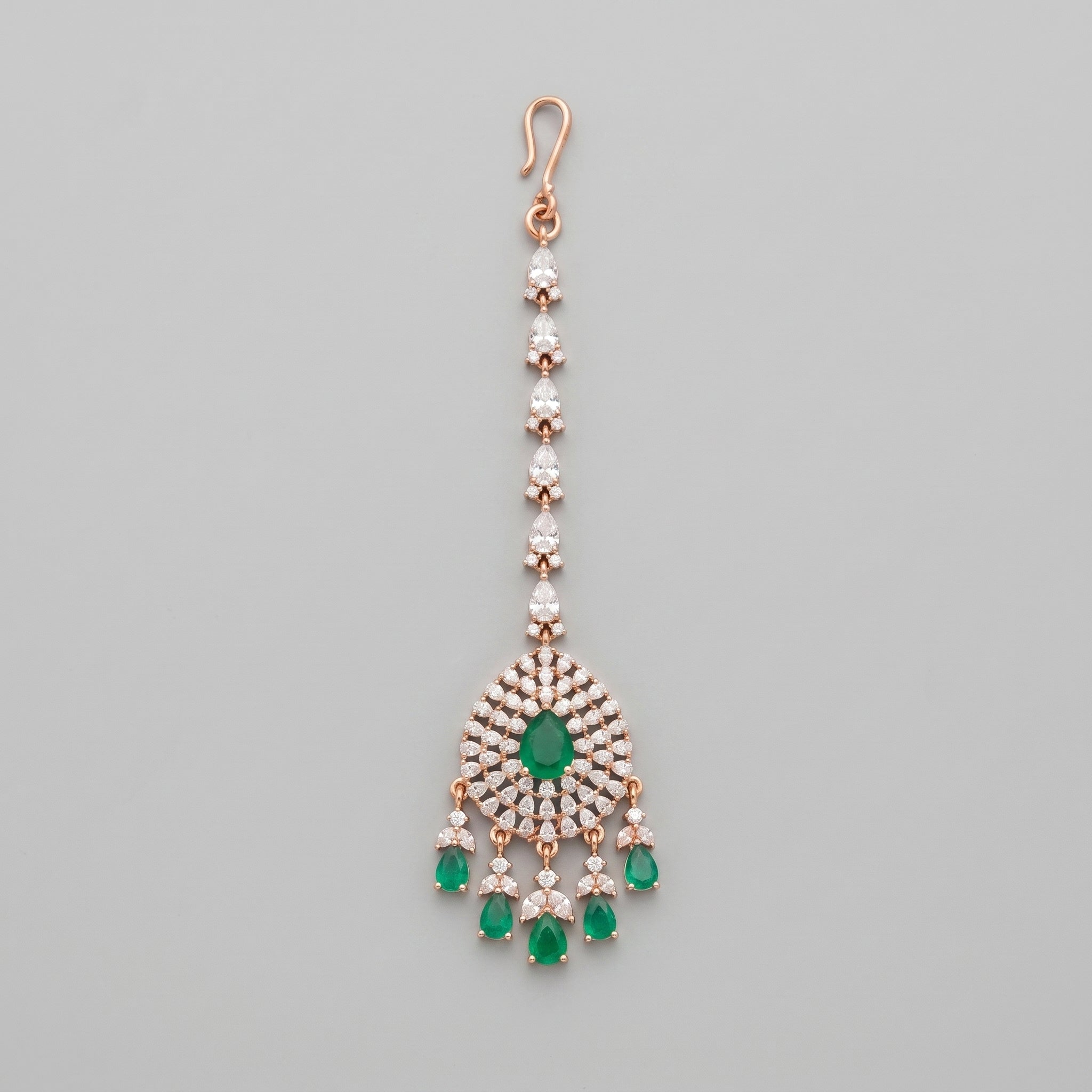 Panna Tikka rose-gold maang tikka with emerald green teardrop center
