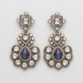 Neelam Bloom Earrings oxidized silver chandelier drops with blue cat's eye pear stones on gray background