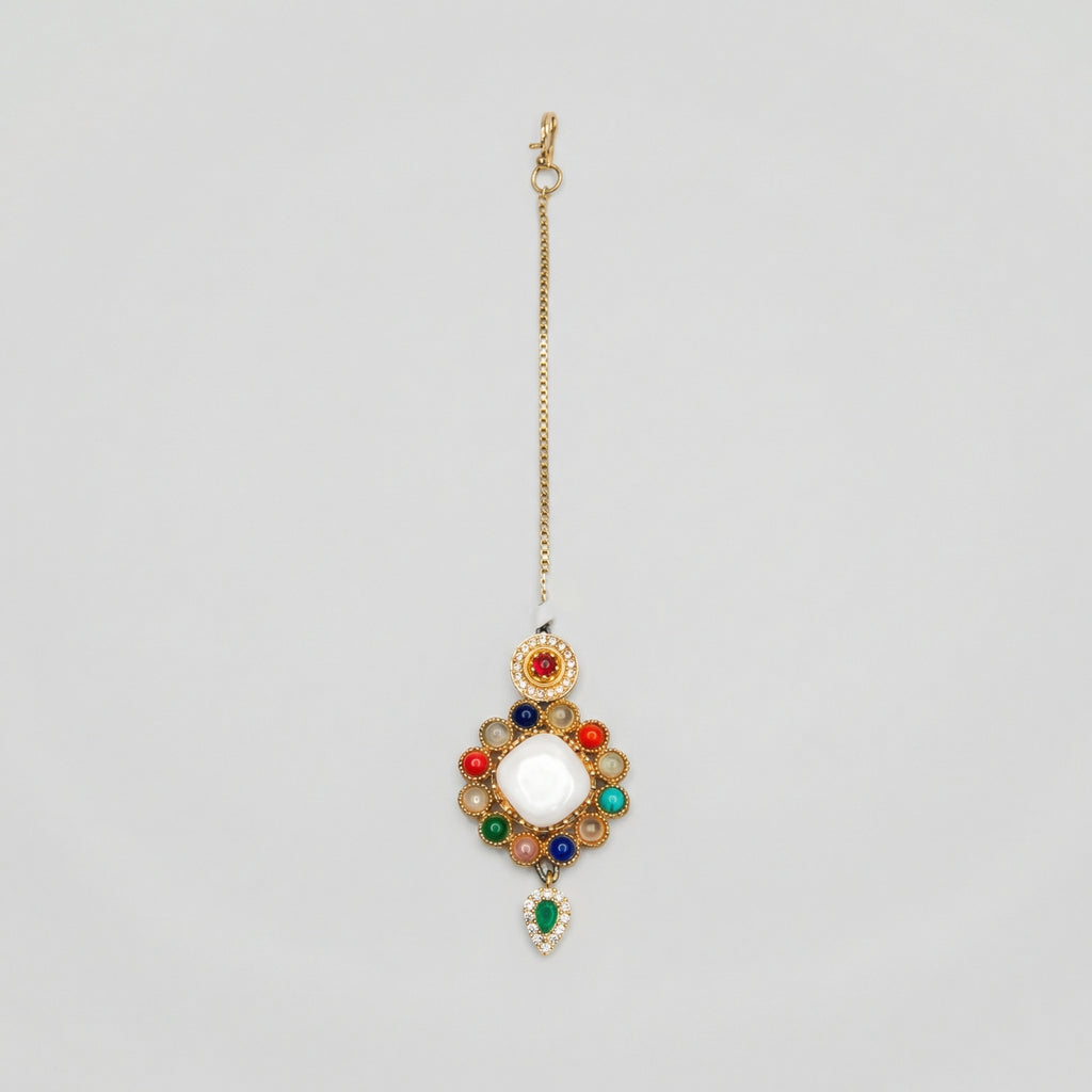 Rangoli Moti Tikka gold maang tikka with multicolor navratna circle and green teardrop drop on gray background