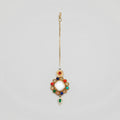 Rangoli Moti Tikka gold maang tikka with multicolor navratna circle and green teardrop drop on gray background