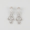 Noor Cascade Earrings rhodium-plated tiered crystal pavé chandelier fans on gray background