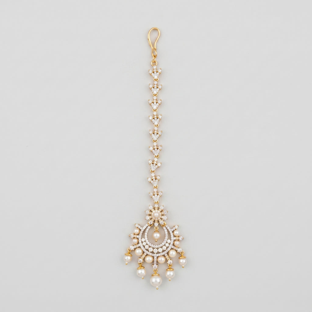 Chand Pearl Tikka gold chaandbali maang tikka with crystal chain and pearl drops on gray background