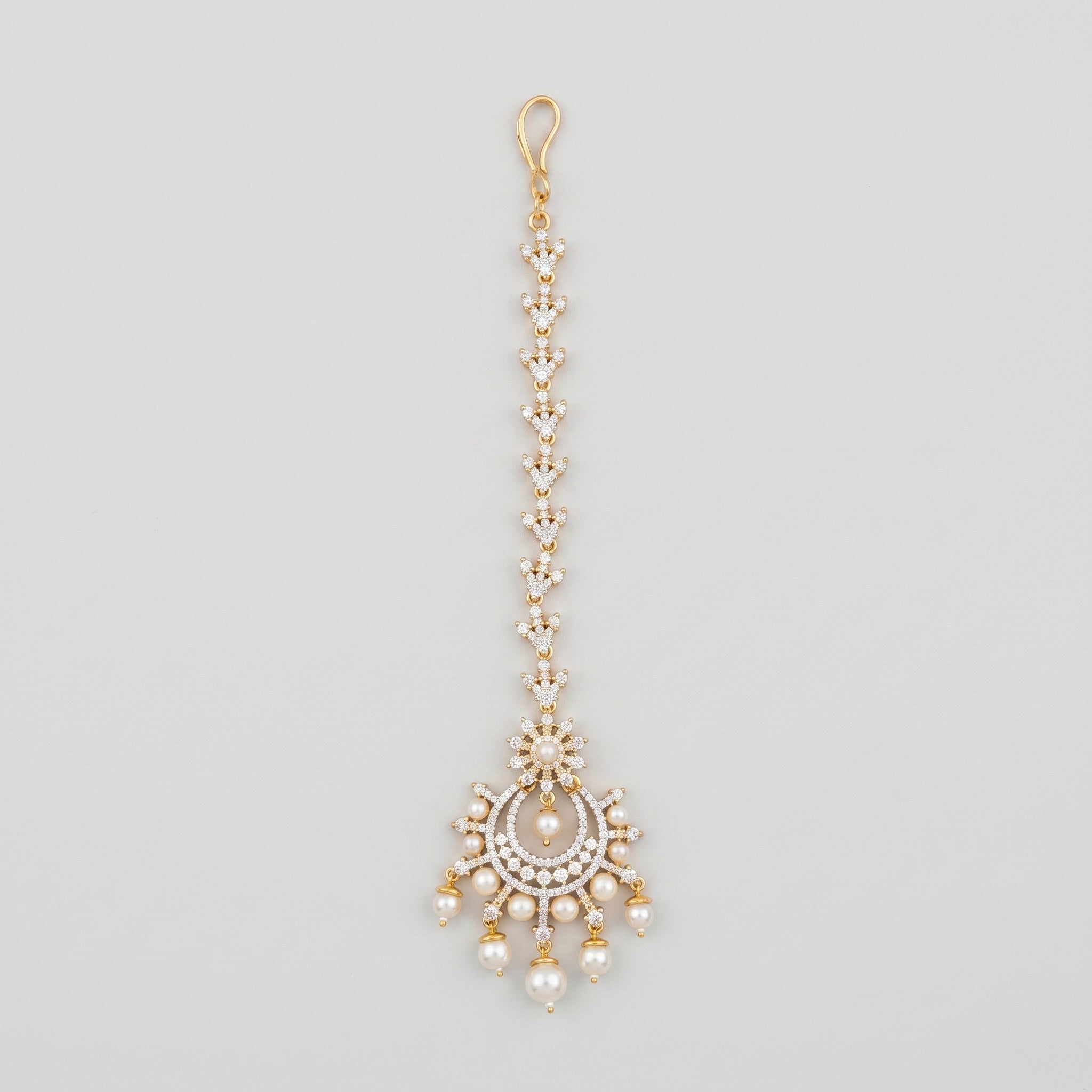Chand Pearl Tikka gold chaandbali maang tikka with crystal chain and pearl drops on gray background