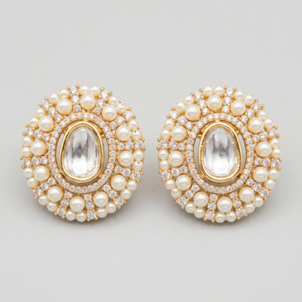 Kundan Pearl Earrings gold kundan studs with clear center and pearl crystal border on gray background