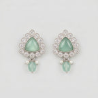 Rani Aqua Earrings rhodium-plated mint green triangular stud drops with pearl accents on gray background