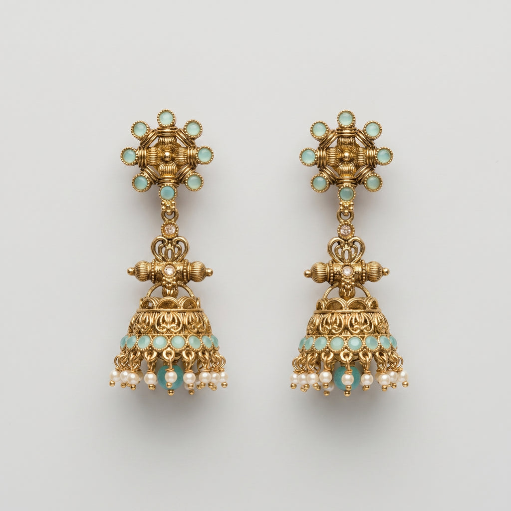 Tara Mint Earrings gold jhumka drops with aqua cabochons and pearl fringe on gray background