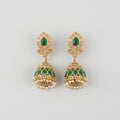 Panna Jhumka Earrings gold-tone emerald jhumkas with green teardrop stones and pearl fringe on gray background
