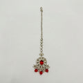 Ruby Bloom Tikka silver maang tikka with red oval center and red bead pearl fringe on white background