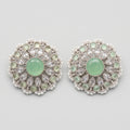 Mint Bloom Earrings silver circular studs with mint green center and pearl border on gray background