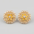 Surajmukhi Earrings gold sunflower studs with yellow pear petals and crystal border on gray background