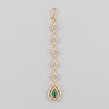 Priya Emerald Tikka gold-tone maang tikka with rhombus links and green teardrop pendant on gray background