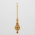 Padma Crimson Tikka antique gold maang tikka with crimson stones on gray background