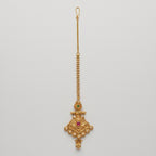 Jadau Ruby Tikka antique gold jadau maang tikka with ruby center on gray background