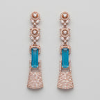 Rani Firoza Earrings rose gold-tone long drops with blue emerald-cut centers on gray background